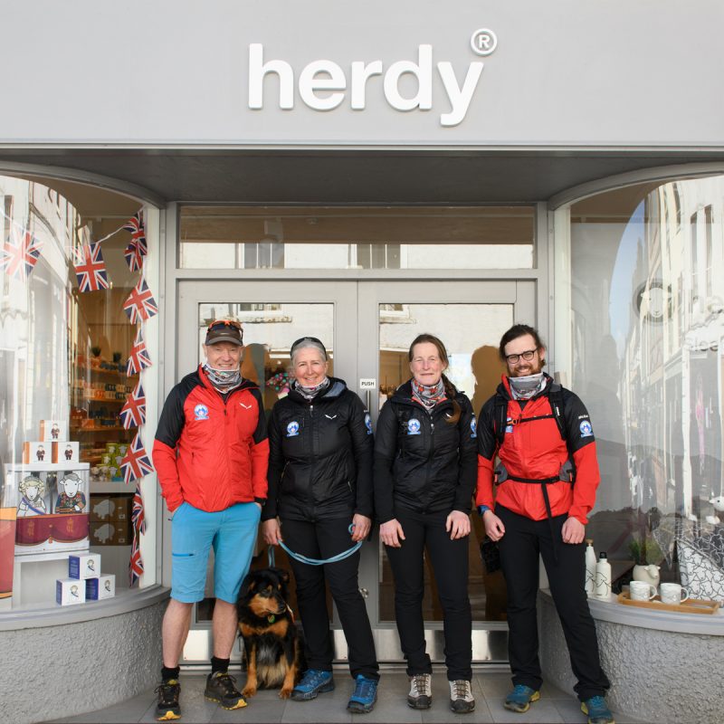 members of Lake District Mountain Rescue stand outside the Herdy kendal store